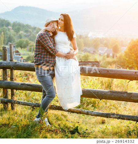 happy loving couple in the mountains happy loving couple in the mountains 26914332