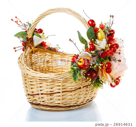 Basket decorated with flowers on white background 26914631