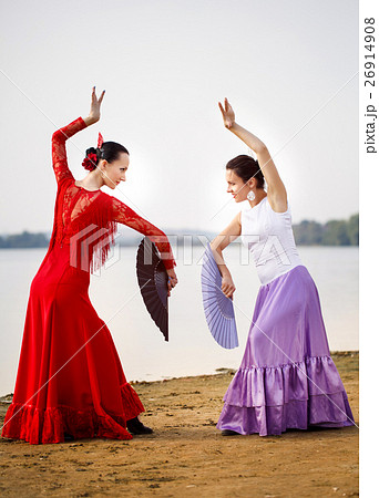 womans dancer wearing red dress 26914908