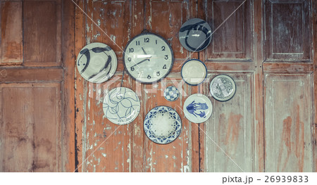 Classical alarm clock on old wood wall 26939833