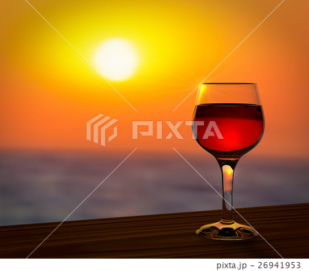 Red wine glass at the summer sunset 26941953