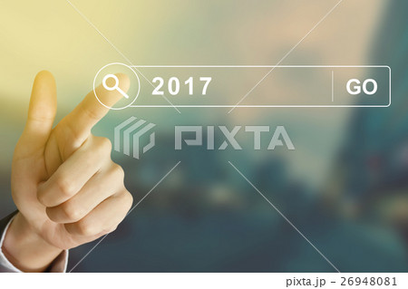 business hand clicking 2017 button business hand clicking 2017 button 26948081