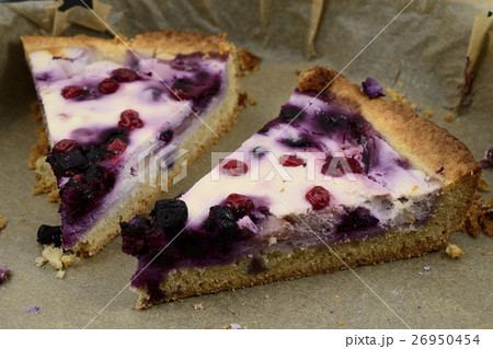 slices of cake with cream cheese with blueberries  26950454