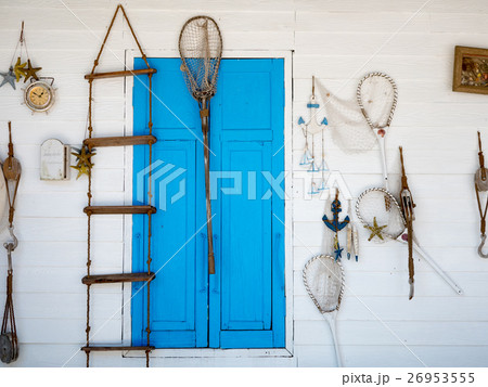 Beach fishing decoration in a white wall Beach fishing decoration in a white wall 26953555