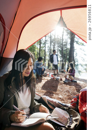 Woman Reading Traveling Destination Camping Concept Woman Reading Traveling Destination Camping Concept 26956811