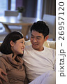 Young couple at home looking at each other and smiling 26957120