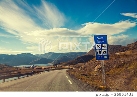 Driving a car on mountain road. Driving a car on mountain road. 26961433