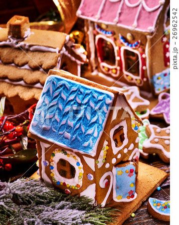 Gingerbread House with blue roof in foreground. 26962542