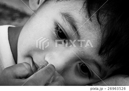 Face cute little boy sad alone  26963526