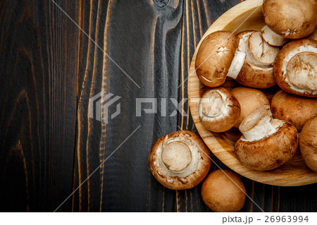 champignon mushroom on wooden background champignon mushroom on wooden background 26963994