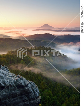 Autumn sunrise forest, fall valley full of mist Autumn sunrise forest, fall valley full of mist 26967645