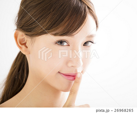 closeup beautiful young woman face closeup beautiful young woman face 26968265