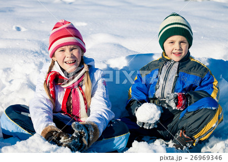 Happy little children playing in winter snow day. Happy little children playing in winter snow day. 26969346