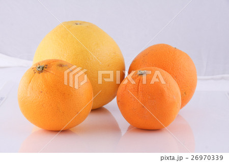 Orange in white background. 26970339