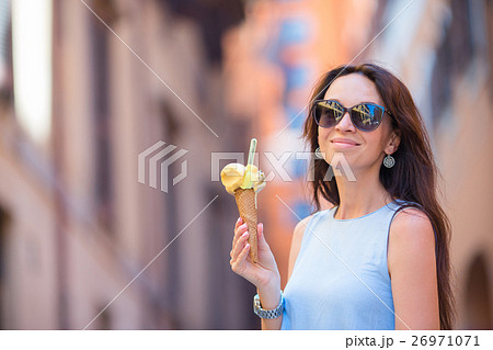 Attractive woman on the street having fun and 26971071