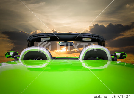 The green car with sunset The green car with sunset 26971284