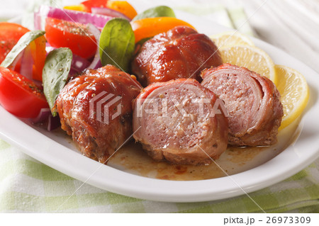 Baked rabbit fillet and salad of tomatoes, peppers Baked rabbit fillet and salad of tomatoes, peppers 26973309