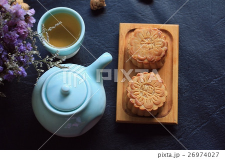Festival moon cake and hot tea - Chinese cake Festival moon cake and hot tea - Chinese cake 26974027