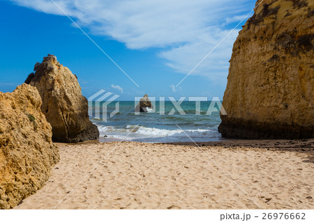 Rocky cliffs on the coast of the Atlantic ocean Rocky cliffs on the coast of the Atlantic ocean 26976662