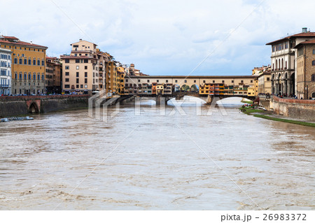 water of Arno river and Ponte Vecchio in autumn water of Arno river and Ponte Vecchio in autumn 26983372