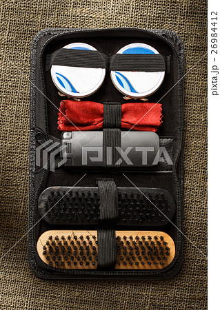 Set of polish cream and shoe brushes Set of polish cream and shoe brushes 26984412