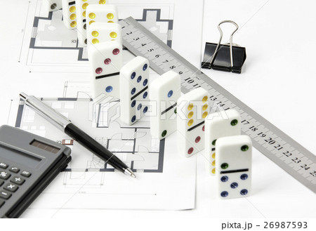 Home plan, calculator, ruler, pen, domino pieces Home plan, calculator, ruler, pen, domino pieces 26987593