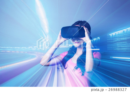woman using VR headset glasses 26988327
