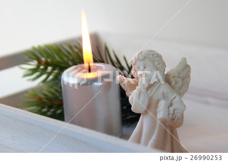 Candle with angel 26990253