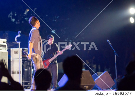Blurred image of singer on stage in free concert Blurred image of singer on stage in free concert 26992077
