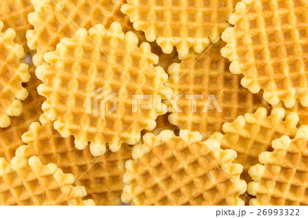 Bunch of golden baked waffle cookies Bunch of golden baked waffle cookies 26993322