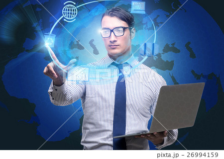 Businessman with laptop in computing concept 26994159