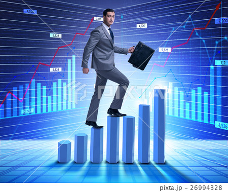 Businessman climbing bar charts in business Businessman climbing bar charts in business 26994328