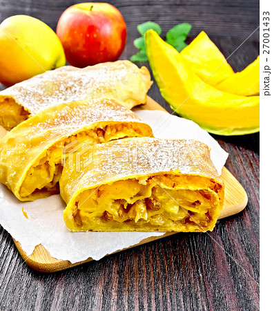 Strudel pumpkin and apple with raisins on board 27001433