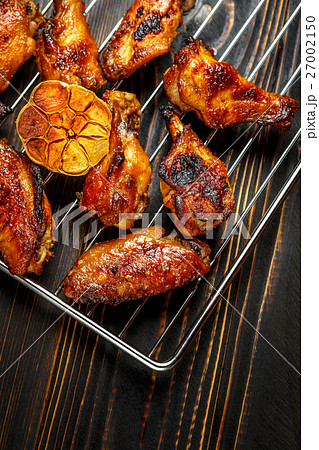 Grilled chicken wings on the grill Grilled chicken wings on the grill 27002150