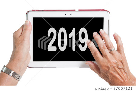 Senior lady relaxing and her tablet - 2019 27007121