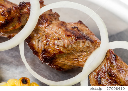 Traditional beef shish kebab on skewers. 27008410