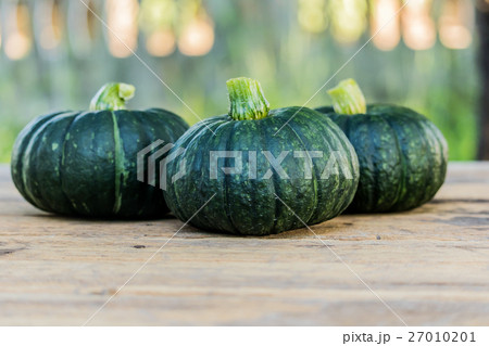Japanese pumpkin on wooden board Japanese pumpkin on wooden board 27010201