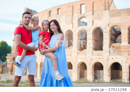 Happy family in Rome over Coliseum background 27011298