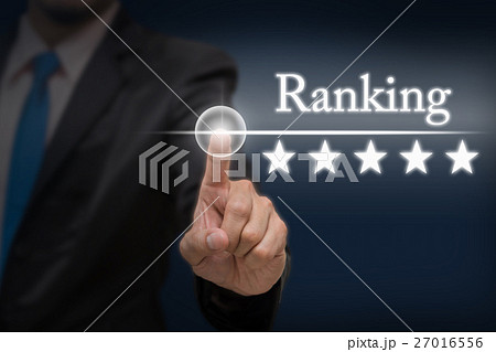 Businessman pointing five star button to increase ranking of hotel on dark blue tone background, business evaluation concept, Increase rating 27016556