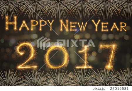 Happy new year 2017 written with Sparkle firework on black background, celebration and greeting cards concept 27016681