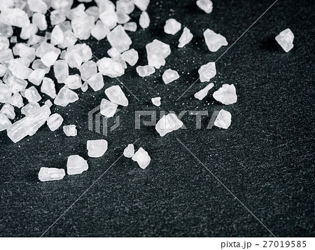 coarse sea salt on stone close up 27019585