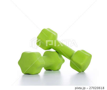 Fitness concept with two green dumbbells on white 27020618