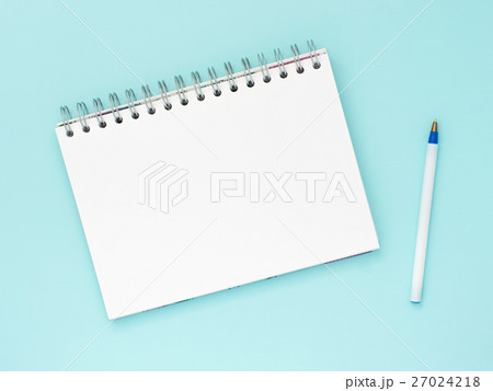 blank note paper on blue background blank note paper on blue background 27024218