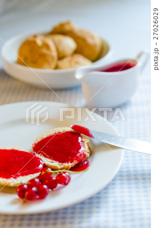 scone with redcurrant jam scone with redcurrant jam 27026029