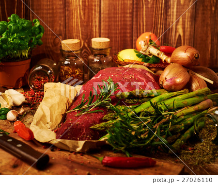 Fresh raw meat with herbs, spices and vegetables Fresh raw meat with herbs, spices and vegetables 27026110