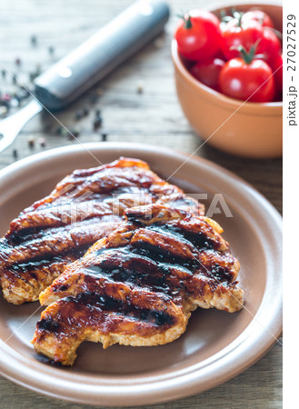 Grilled pork steaks on the plate Grilled pork steaks on the plate 27027529