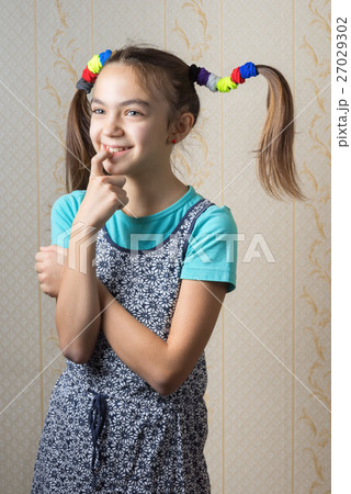 Mischievous 11-year-old girl 27029302