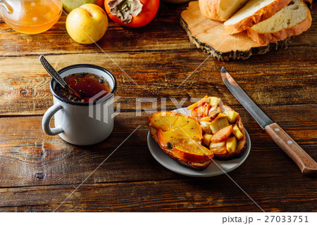 Fast Breakfast with Tea and Fruit Toast 27033751