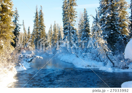 Beautiful winter sunset on the river in Russia 27033992