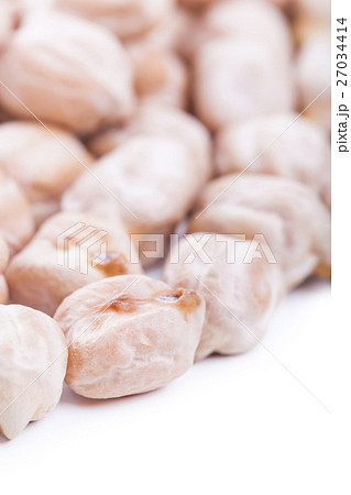 Raw dry chickpeas on white background Raw dry chickpeas on white background 27034414